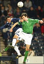 Steven Thompson in action with Gary Breen