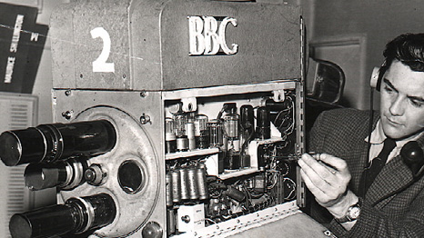 BBC cameraman Bob Unsworth makes an adjustment, 1959 ©BBC