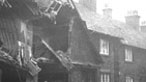 Black and white image of bombed houses