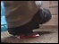 Booted foot crushing can