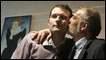 Blogger Adnan Hajizade (left) reacts as his father kisses him at his home in Baku, Azerbaijan, after his release from jail in November 2010. Photo: Reuters/Irada Humbatova 