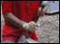 Stonemason trimming rock
