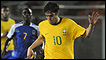 Jogador tanzaniano Nzzar tenta parar Kaká durante jogo em Dar Es Salaam