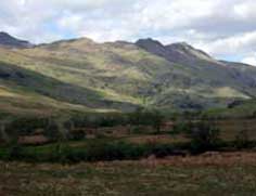 Hills to north