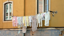 A list of useful phrases in Portuguese. Washing line, the Alfama, Lisbon © BBC