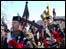 Pipers from the Atholl Highlanders cross Dunkeld Bridge