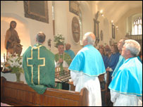 Pilgrims at the restored Shrine