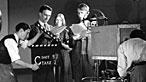 Black and white image of a film shoot