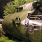 Authentic props on set. This is the wreckage of the fighter plane that crash lands in the scene