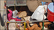 Refugees returning to Swat valley, packed tightly into a truck along with their possessions