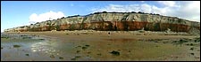 Red and white cliffs on Hunstanton beach: link