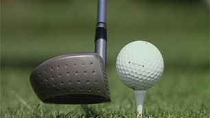 Golf ball and club