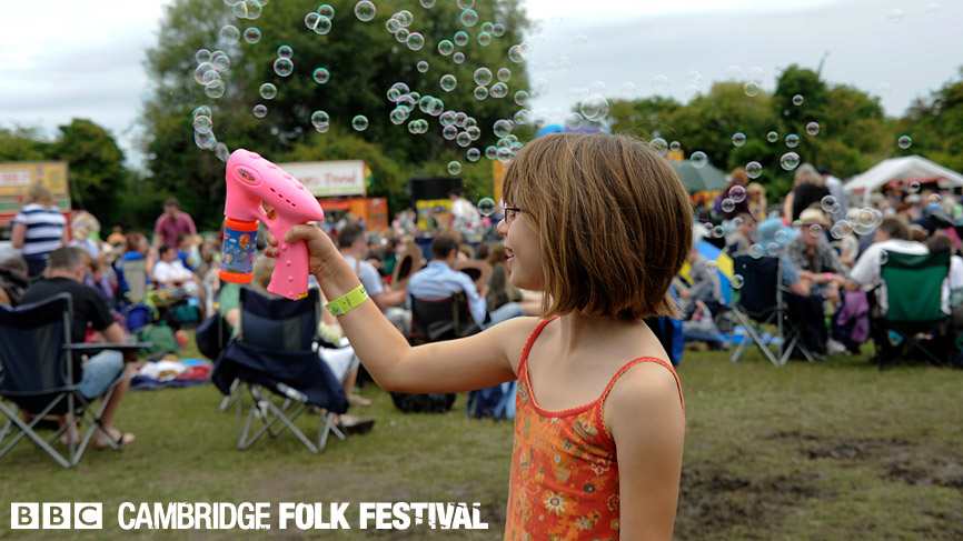 A young folk fan enjoying Saturday's warm weather.