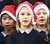 Plant yn canu carolau