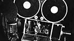 Black and white image of a camera