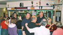 People at the bar in the deaf club