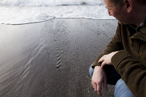 Tom mesmerised by the tiny rivulets