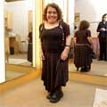 Emma is very pleasantly surprised by the dark brown skirt