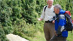 Jim points out an old stone, engraved with the date 1969 