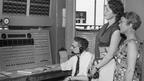 Norwegian students, Karl Naesvold (left) and Ruth Oftedal (right) being shown the BBC Control Room at Bush House.