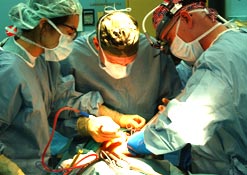 Surgeons carrying out an operation