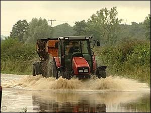 A tractor in flood water