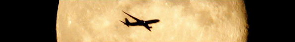 Plane against a planet