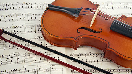 Photograph of a violin and music score