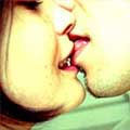 Close-up of a man and woman kissing