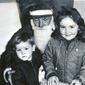 Deirdre and her brother Paul with Santa, circa Christmas 1967