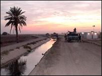 A tank at sunset
