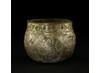 The Frankish cup is decorated with animals: a doe, lion, horse, stag and a large cat. (c) Trustees of the British Museum