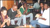 The group socialise, share ideas and provide support.