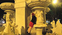 Seaneen on holiday, kissing a statue